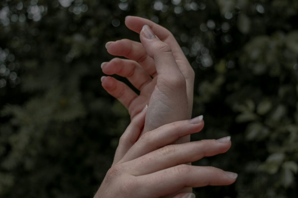 hands that illustrate a self-soothing touch for self compassion practices