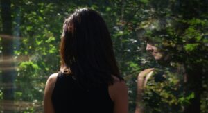 reflection of a woman in the mirror, she's ruminating about life